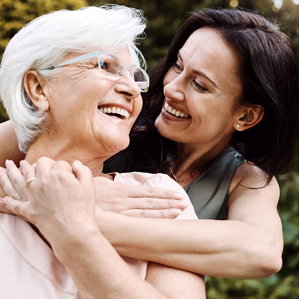 Happy senior woman spending time with her daughter